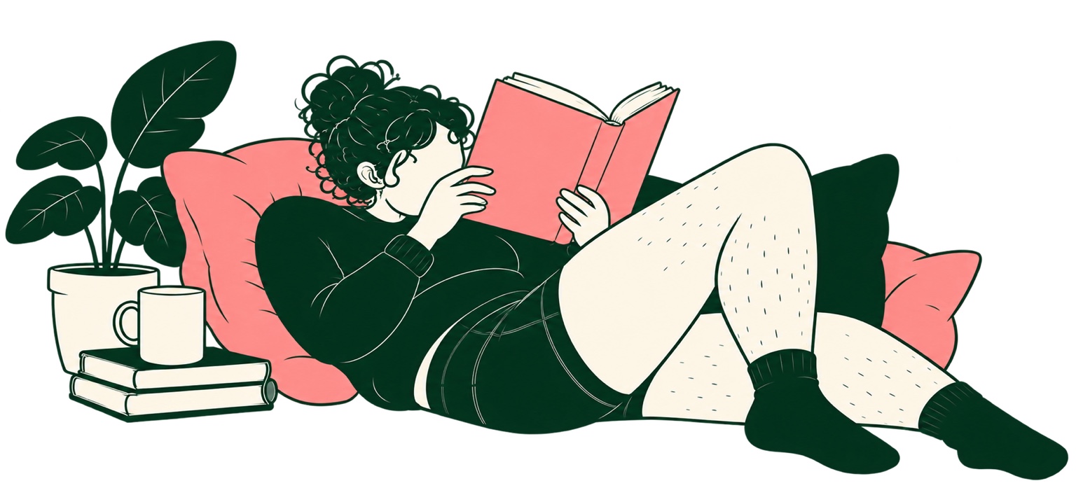 Illustration of a person with curly hair reclining on pink and green pillows, reading a pink book beside a plant, mug, and stack of books